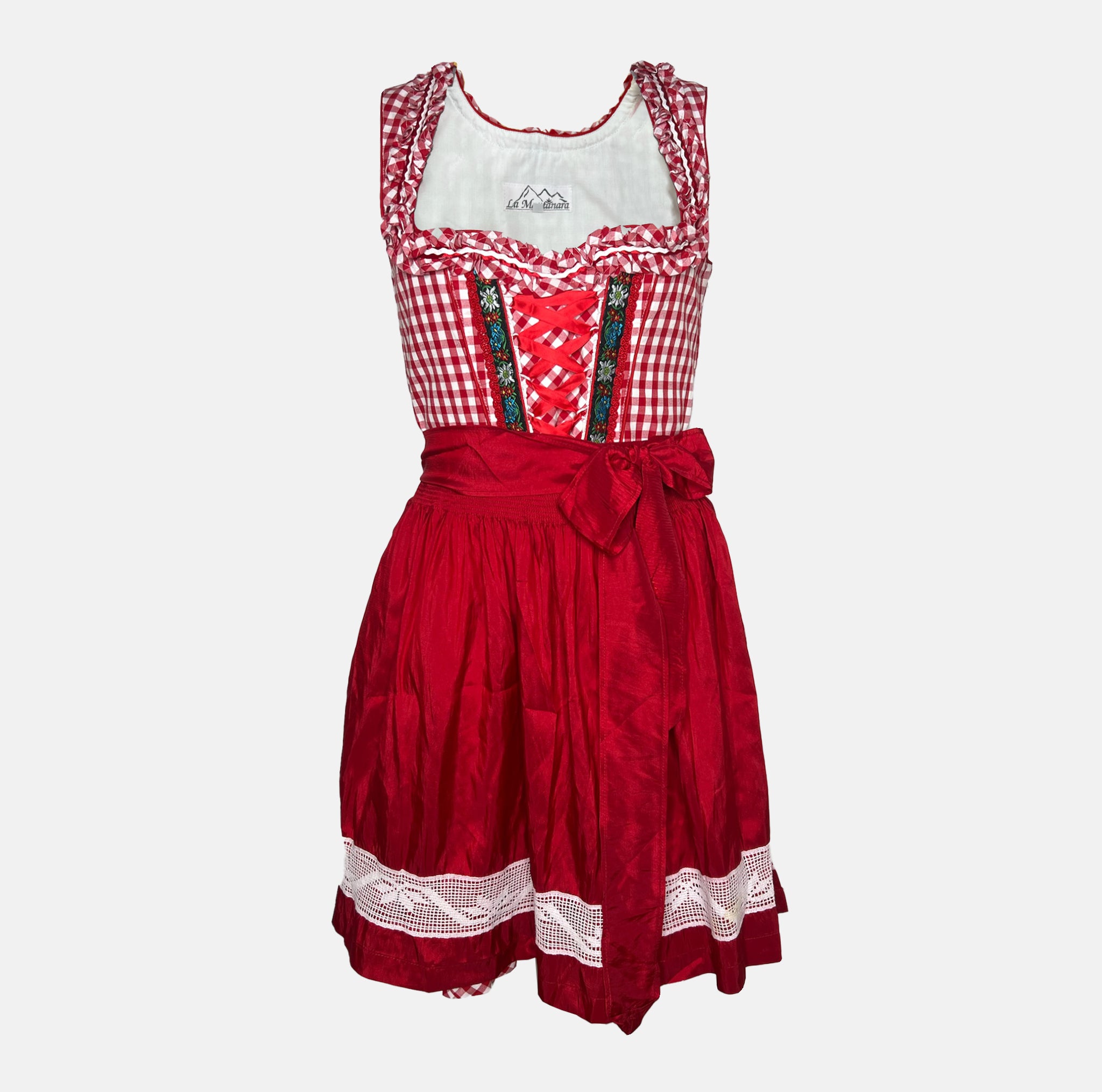 Red Bavarian rental dirndl by La Montana with lace-up bodice, floral trim, and red apron, available at Versatile OTM in Munich, owned by Beer&Pretzel Tours.