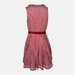 Red Bavarian rental dirndl by La Montana with lace-up bodice, floral trim, and red apron, available at Versatile OTM in Munich, owned by Beer&Pretzel Tours.