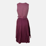 Burgundy Krüger dirndl with floral lace embroidery, satin ribbon bow, and decorative bodice – available for rent at Versatile OTM.