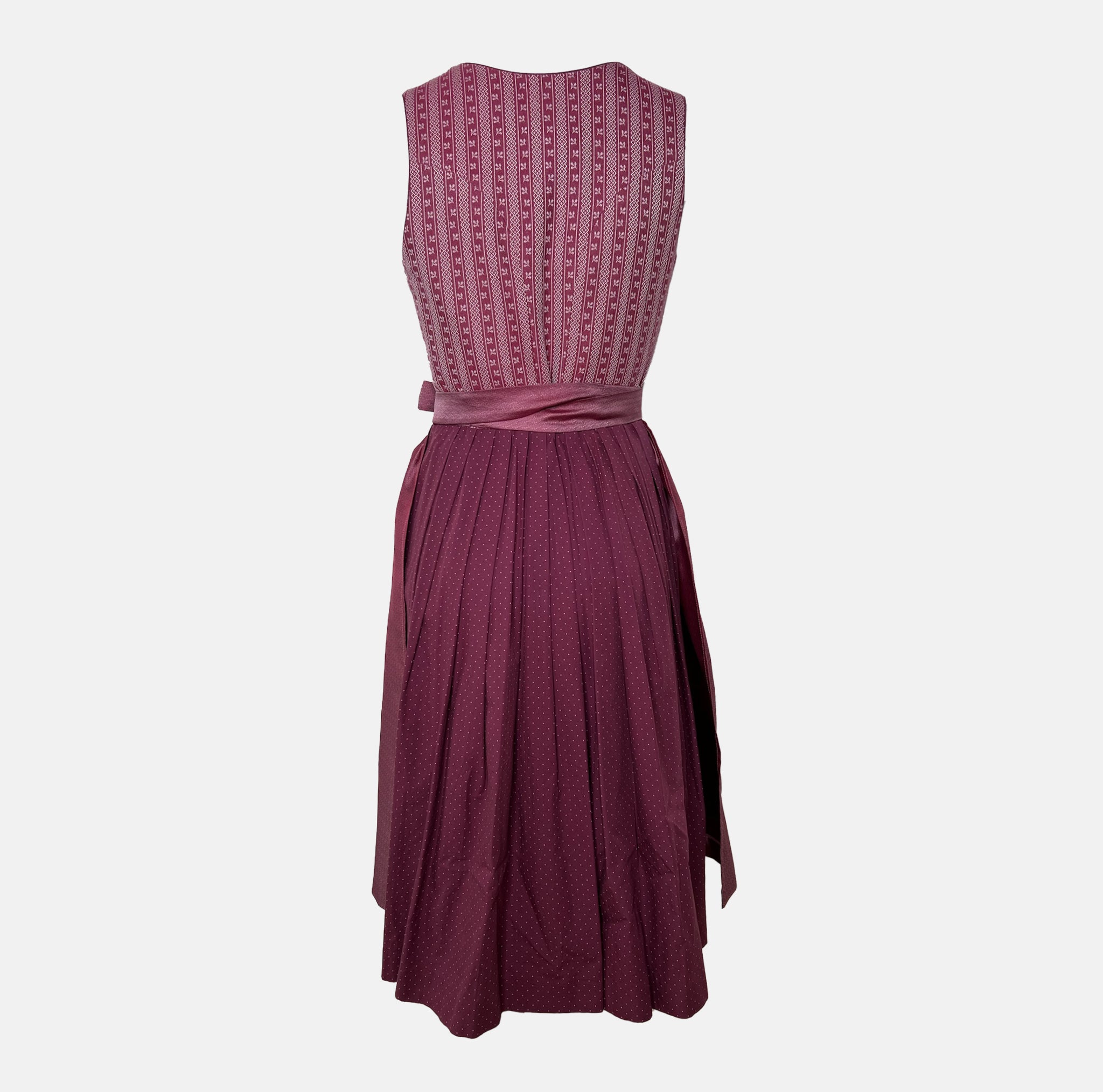 Burgundy Krüger dirndl with floral lace embroidery, satin ribbon bow, and decorative bodice – available for rent at Versatile OTM.