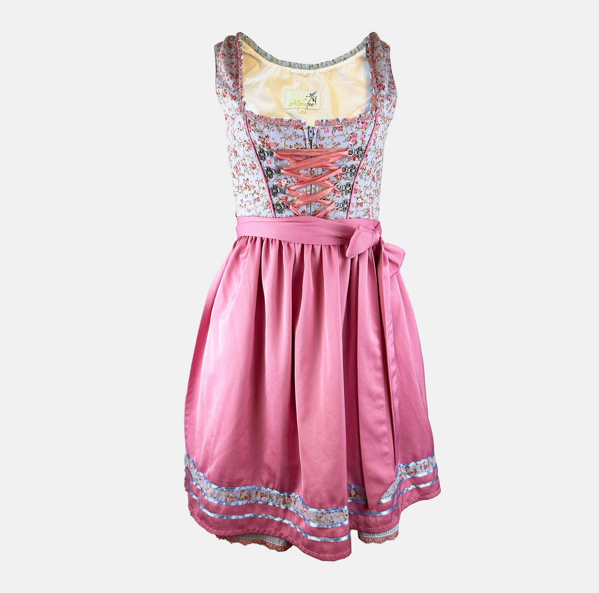 Traditional German dirndl dress with floral top and pink skirt 