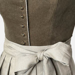 High-quality Alpenherz Dirndl Marie in olive cord with removable wing sleeves – fashionable, modern, and perfectly on trend for Oktoberfest.