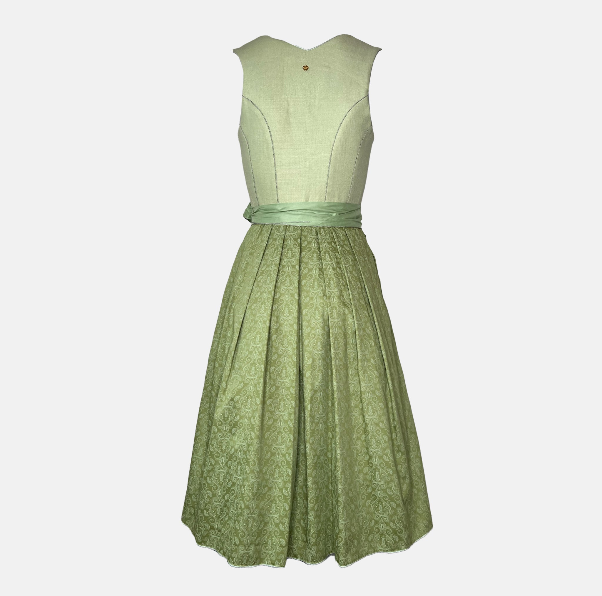 Alpenherz Dirndl Sunny in vibrant apple green with flattering cut and matching apron – fresh, modern, and ideal for festive occasions.