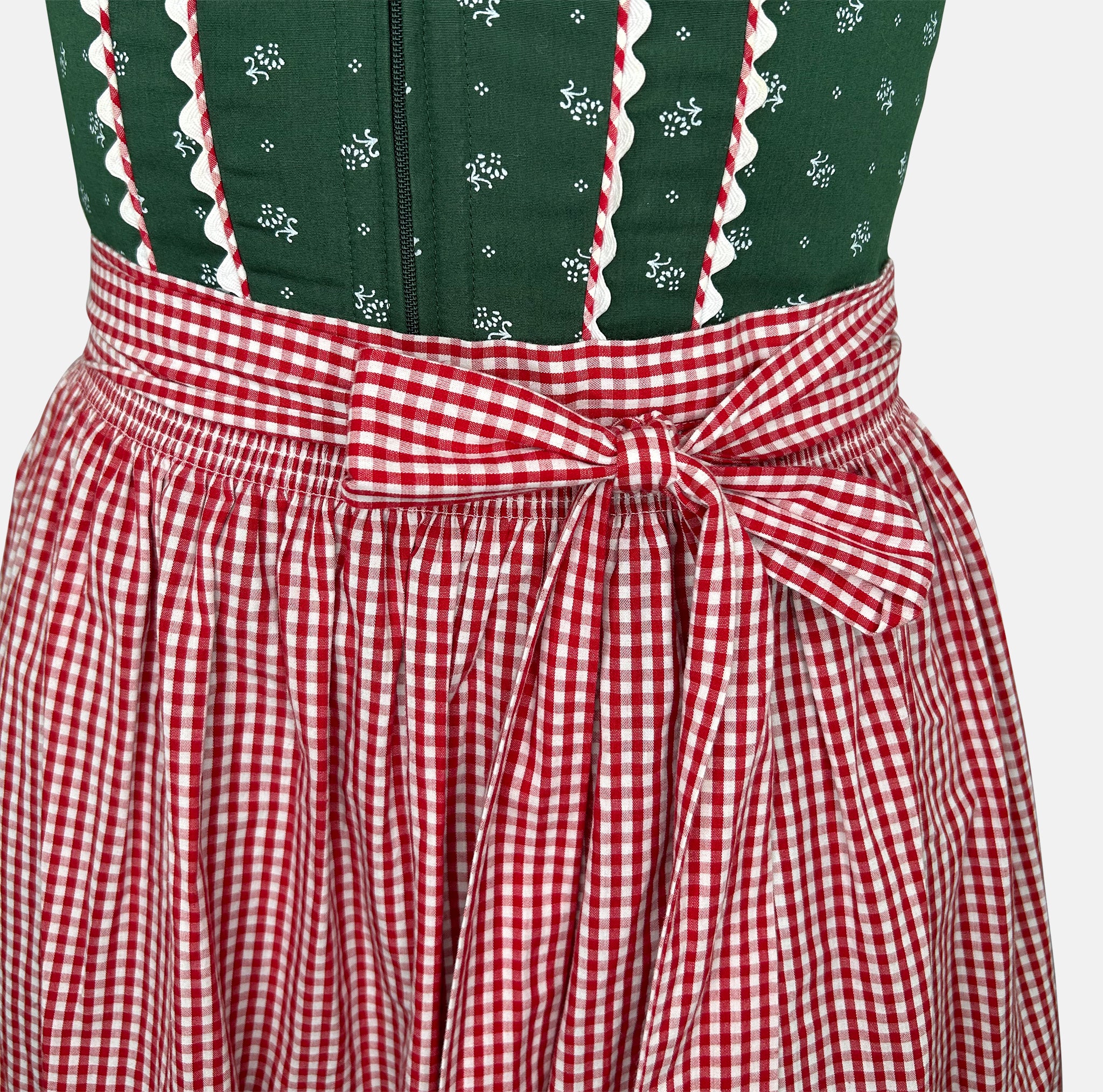 Rent the Angermaier Dirndl  – green floral bodice, zip closure, gingham apron and hem; traditional rental dirndl via Versatile