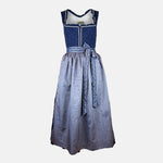 Berwin & Wolff dirndl rental via Versatile – navy floral jacquard bodice with white trim and light blue embroidered apron, ankle‑length Oktoberfest dress