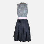 Traditional Berwin & Wolff Dirndl with a grey bodice and pink apron, available to rent at Versatile OTM.