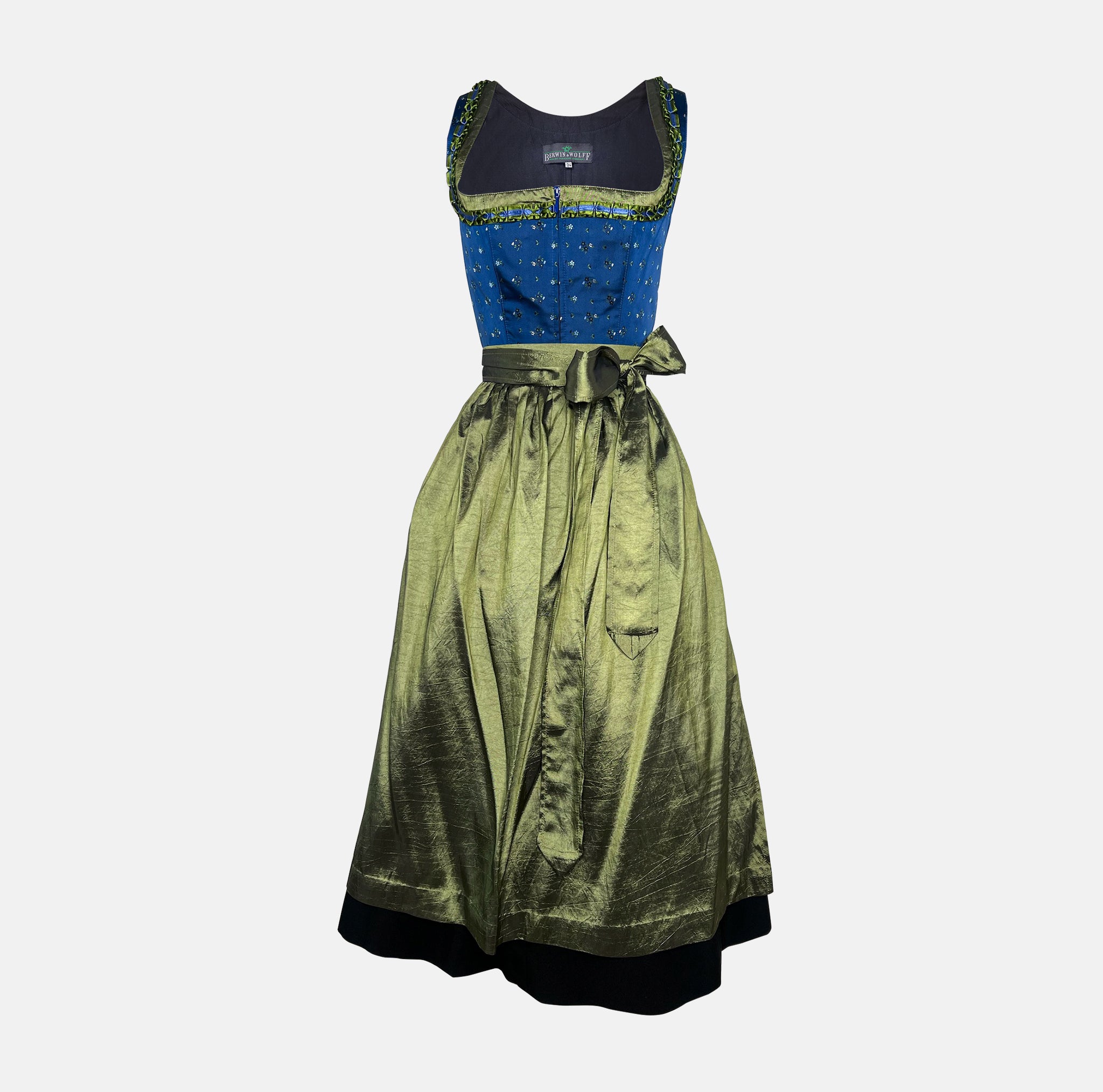 Berwin & Wolff Dirndl with royal blue embroidered bodice and shiny olive-green apron, available to rent at Versatile OTM.