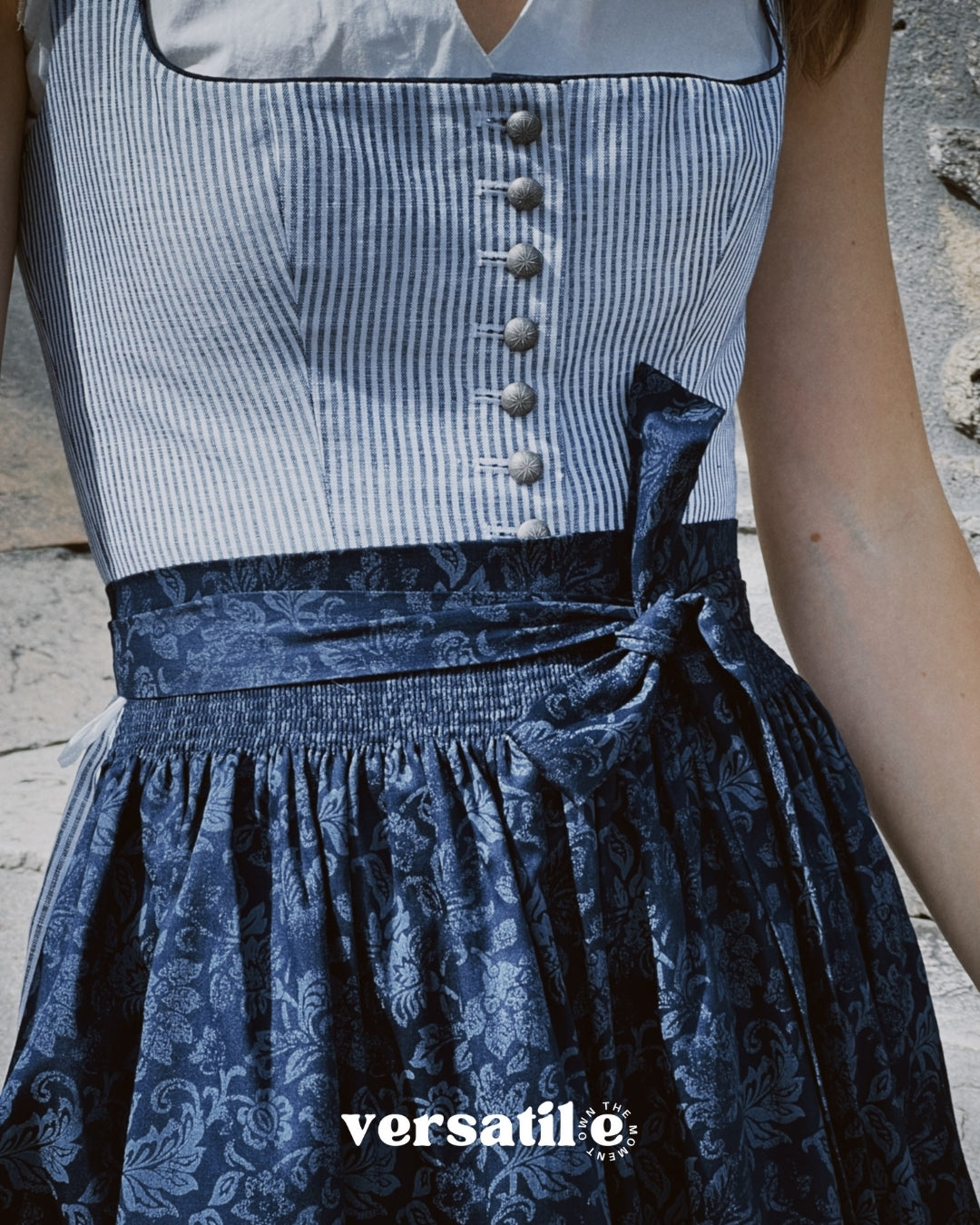 Rent the Berwin & Wolff classic striped Dirndl in Munich—round neckline, button closure, high-quality cotton-linen fabric, 75 cm skirt.