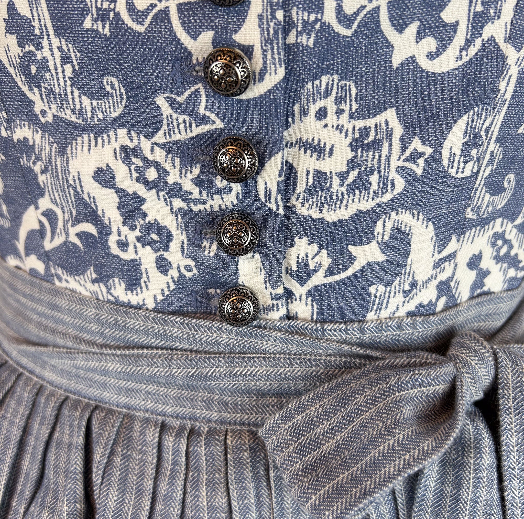 Rent the Berwin & Wolff Dirndl —dark blue ornate bodice, vintage silver buttons, pleated skirt and plaid apron, Oktoberfest dirndl rental