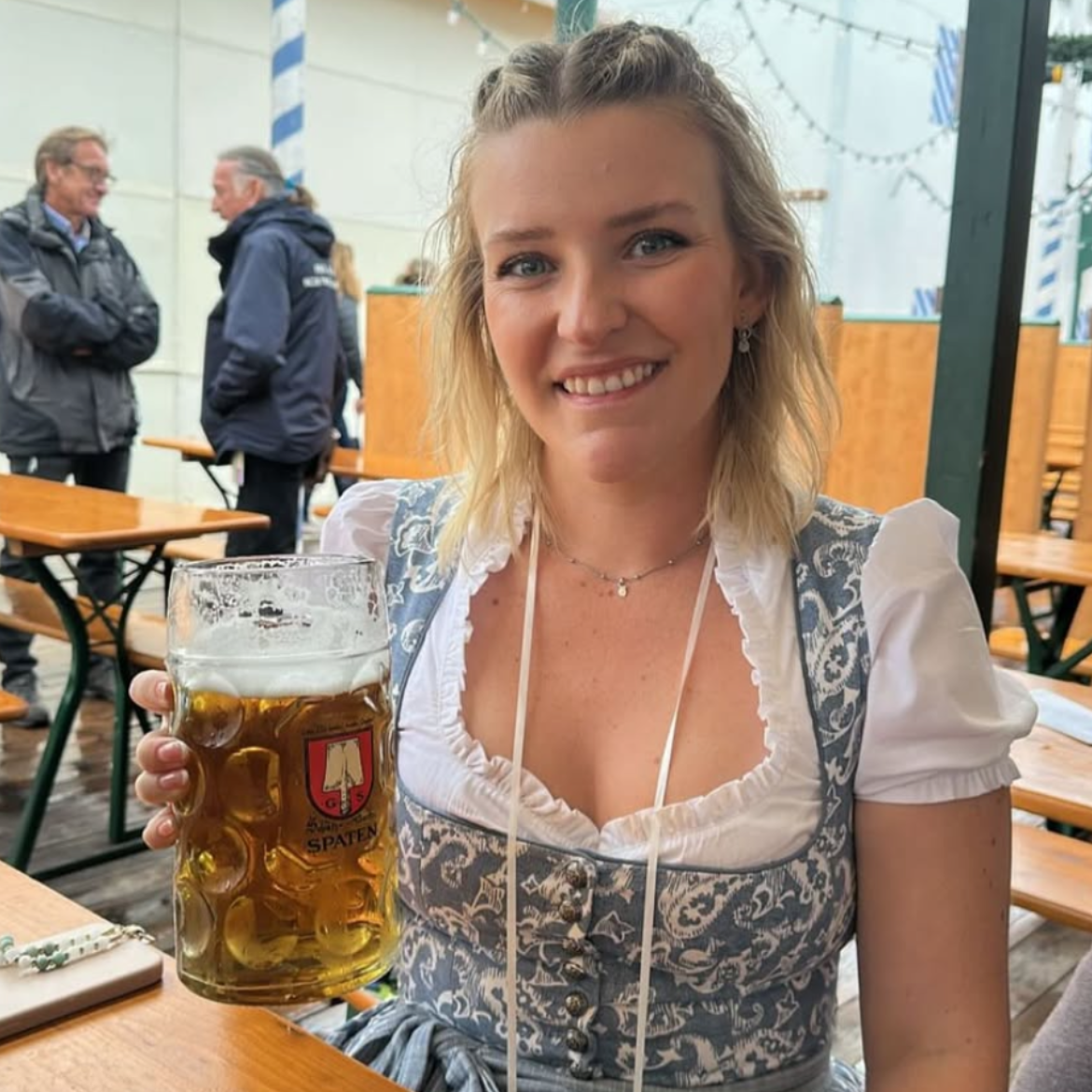 Girl wearing the Berwin & Wolff Ornaments Dirndl rented for Oktoberfest from Versatile OTM rentable Dirndls 