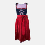 Boss Dirndl featuring a modern silhouette with bold details, combining traditional elements with fashion-forward edge – rentable at Versatile OTM.
