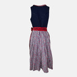 Boss Dirndl featuring a modern silhouette with bold details, combining traditional elements with fashion-forward edge – rentable at Versatile OTM.