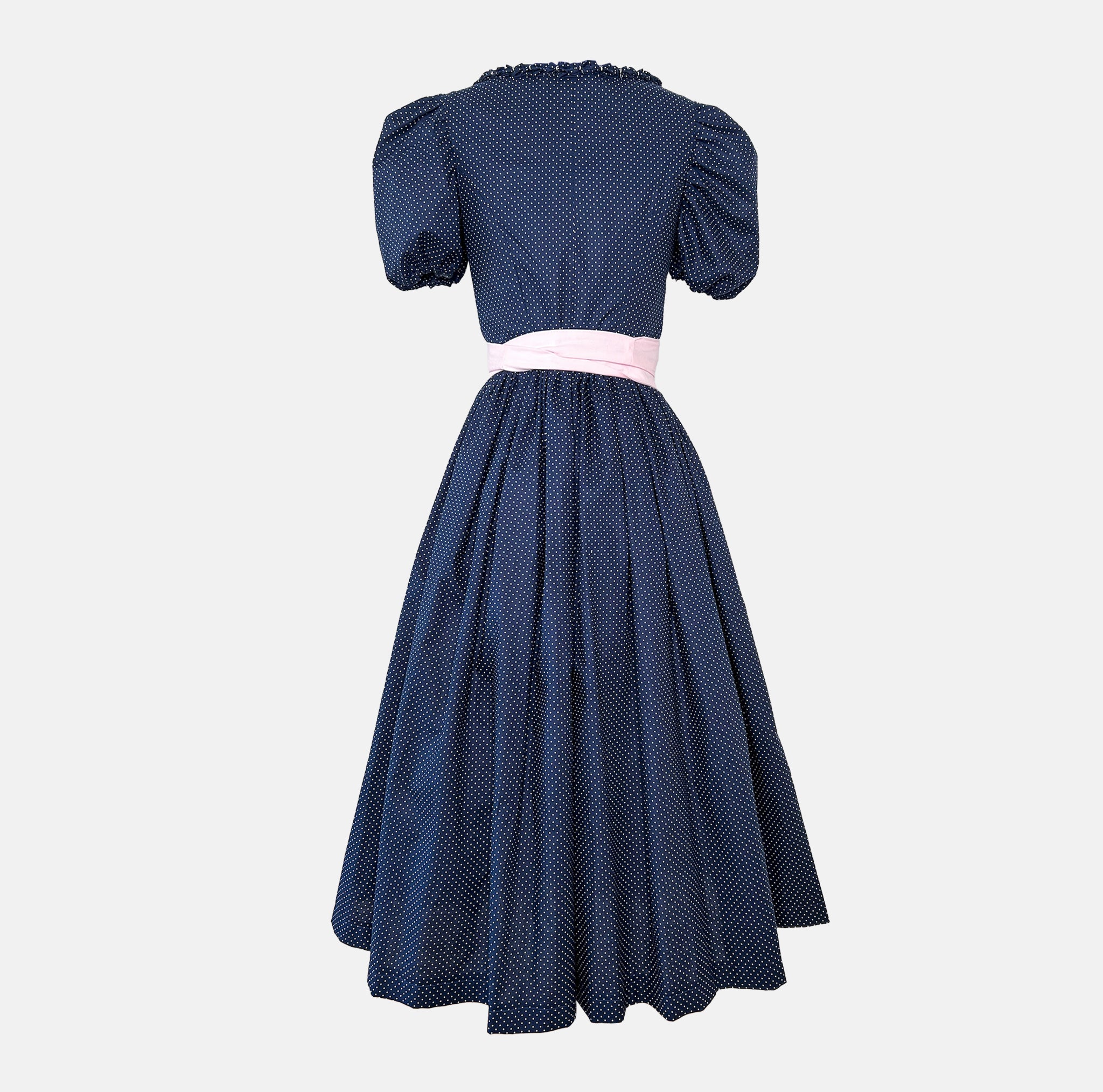 Rent premium Dirndl in Munich: Versatile Collection dress with vintage-inspired navy bodice and pale pink apron for Oktoberfest.
