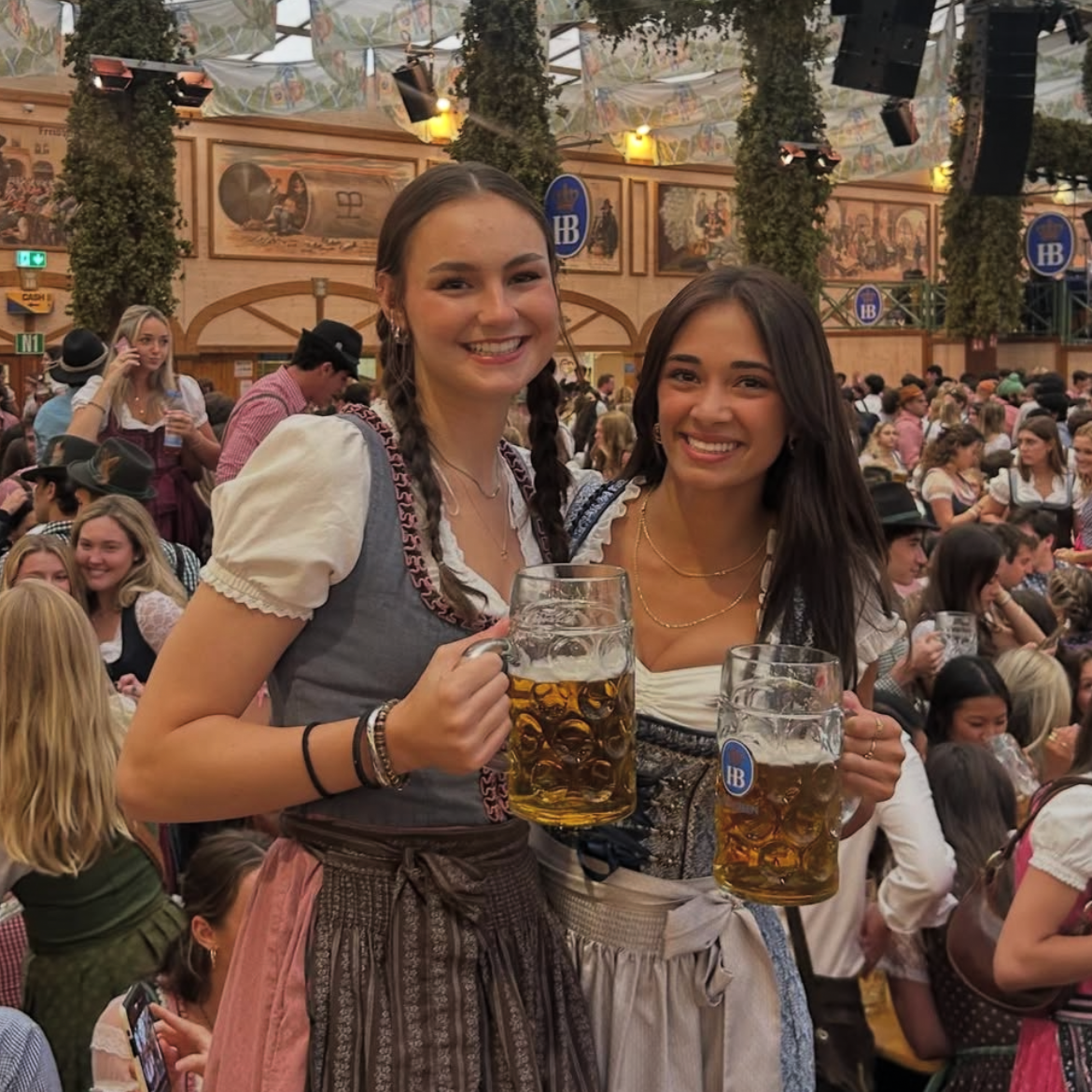 Rented Krüger Dirndl Blue Elegant from Versatile OTM rented for Oktoberfest . Girls wearing Dirndl in beer Tent with steen