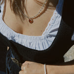 Elegant Gottseidank Monika premium dirndl with black linen bodice, full indigo denim skirt and antique-style buckle—available for Oktoberfest rental in Munich.