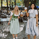 Rent your Hammerschmid Dirndl for Oktoberfest laugh and smile as much as these girls in their rented Dirndls ready to go and have fun