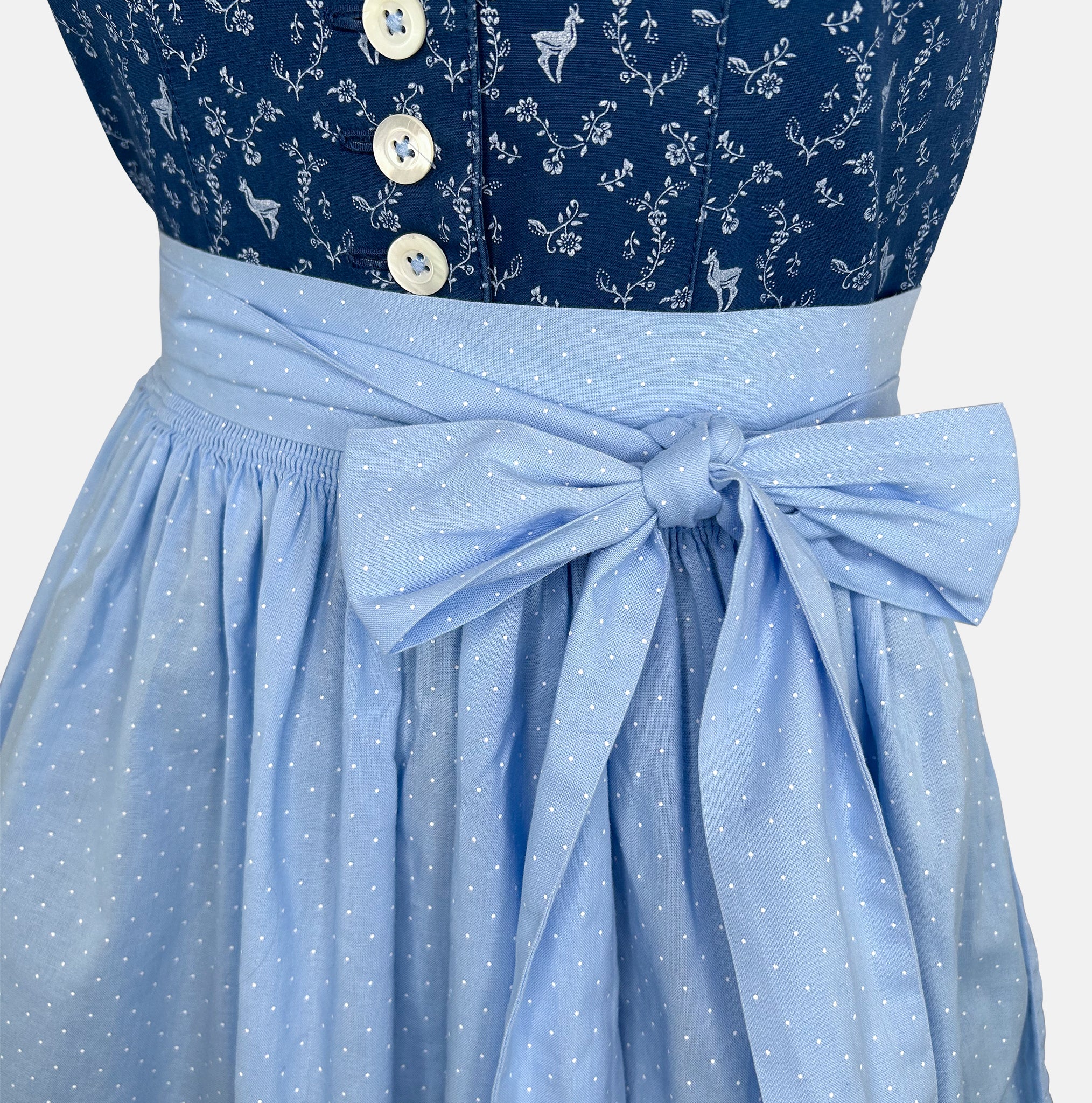 A traditional Bavarian Hammerschmid dirndl dress featuring a floral pattern on the bodice and a solid blue color for the skirt and bow.
