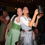 Rent your Hammerschmid Dirndl for Oktoberfest laugh and smile as much as these girls in their rented Dirndls ready to go and have fun. Rent it on Versatile