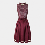 Rent the elegant Krüger dirndl dress Jean with plum bodice and champagne apron – available in Munich or online. Perfect for Oktoberfest and traditional events.