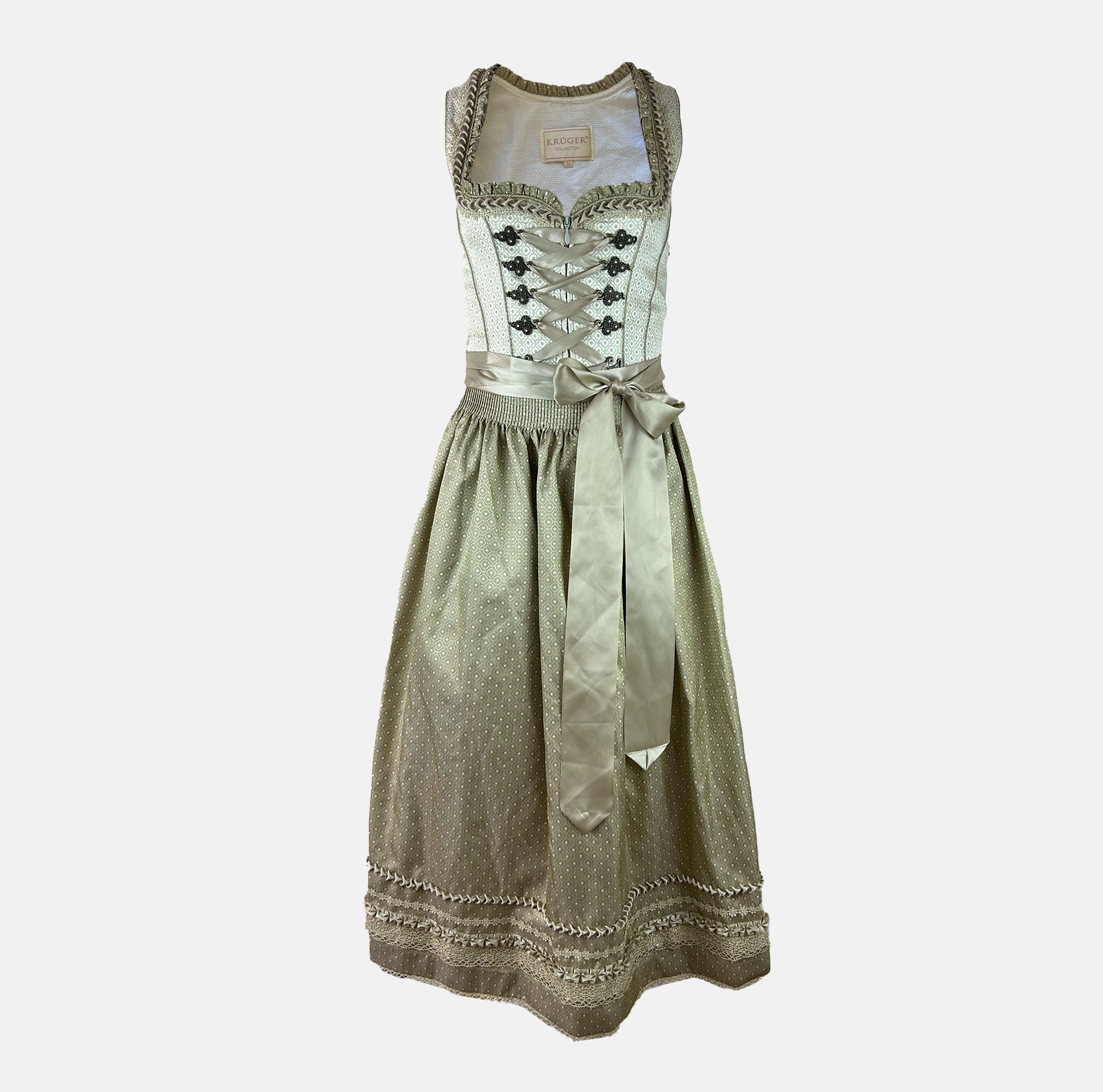 Champagne-colored Krüger dirndl with jacquard bodice, satin ribbon lacing, and a matching full-length apron – refined and timeless.