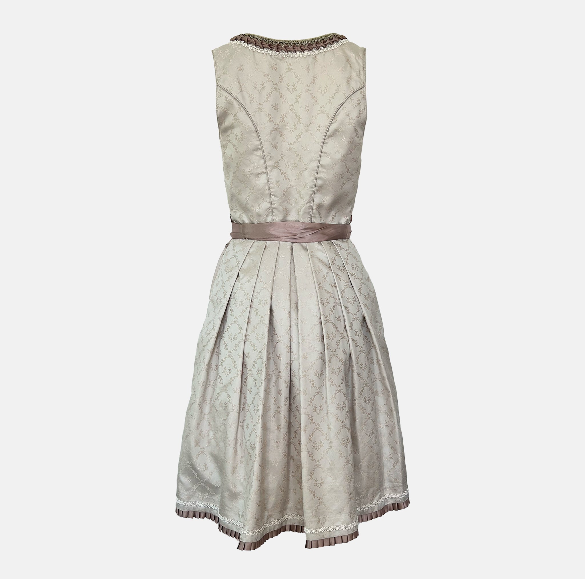 Krüger Bavarian rental dirndl with embroidered cream bodice, pink ribbon lacing, satin sash, and gold lace apron, available at Versatile OTM in Munich.