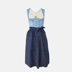 Classic light blue and navy Krüger Dirndl with lace-trimmed neckline and patterned apron – available for rent via Versatile.