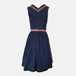 Rent Bavarian dirndl dress – navy and red traditional design with gingham apron and decorative trims, authentic Oktoberfest rental dirndl