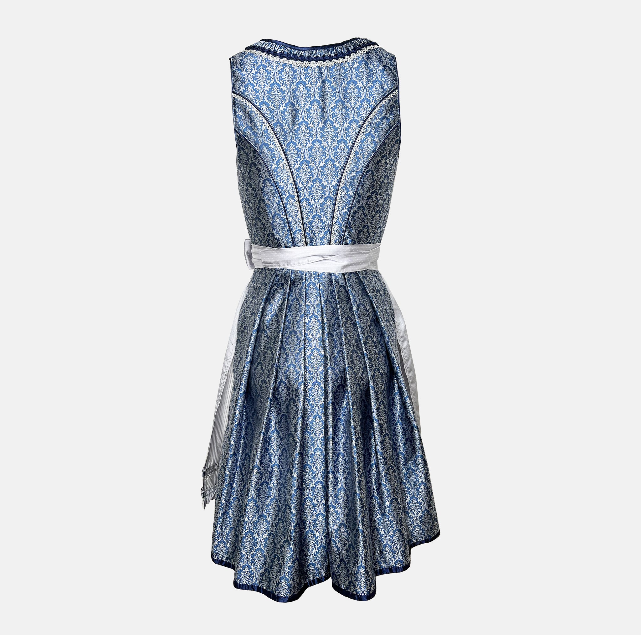 Elegant blue Krüger dirndl with silver apron, brocade bodice, and decorative lace details – available for rent at Versatile.