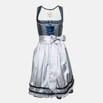 Elegant blue Krüger dirndl with silver apron, brocade bodice, and decorative lace details – available for rent at Versatile.