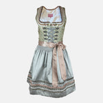 Pastel green Krüger Dirndl with satin ribbon and floral detailing – a refined and trendy option for Oktoberfest or chic celebrations.