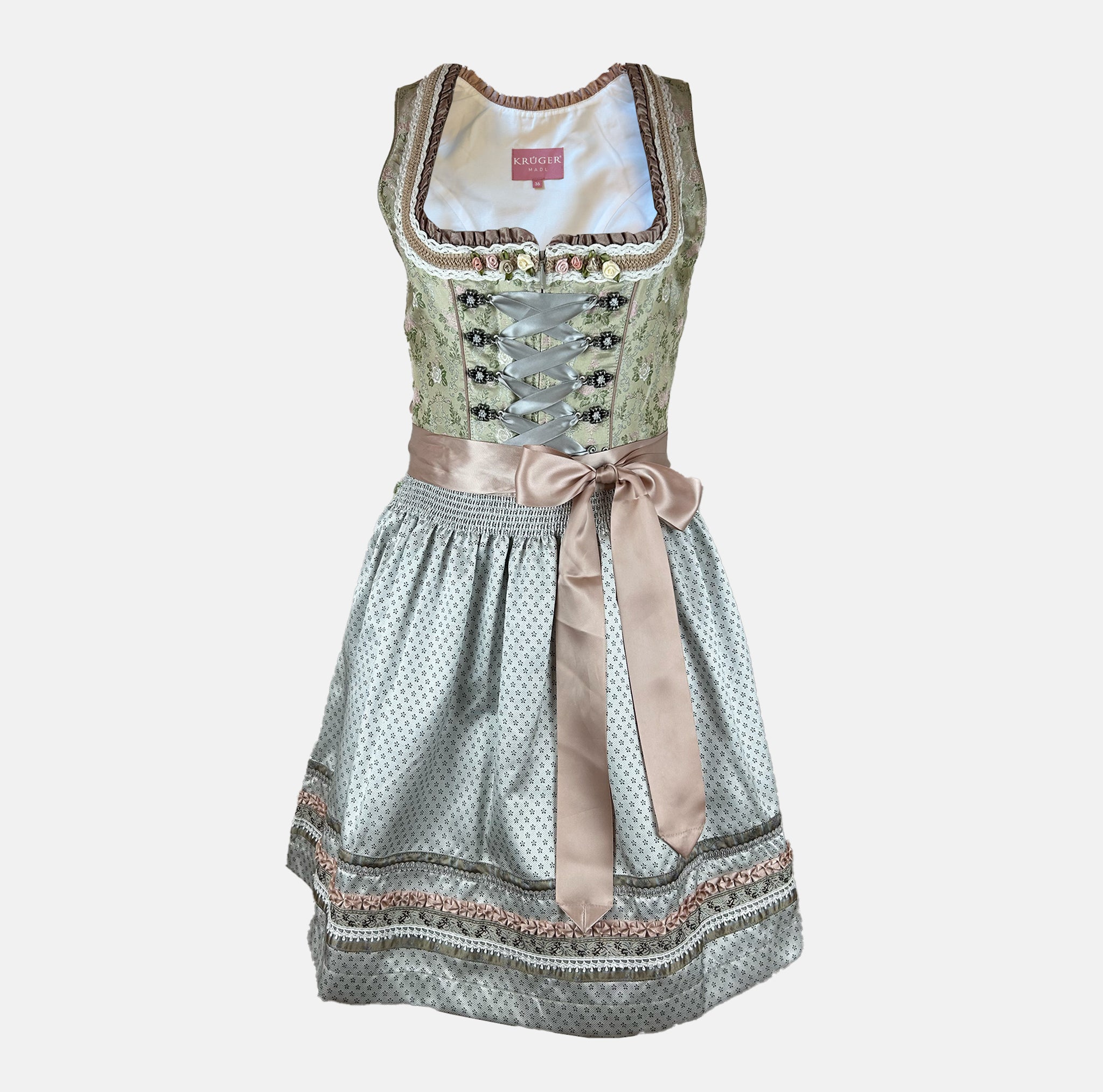 Pastel green Krüger Dirndl with satin ribbon and floral detailing – a refined and trendy option for Oktoberfest or chic celebrations.