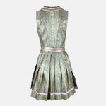 Pastel green Krüger Dirndl with satin ribbon and floral detailing – a refined and trendy option for Oktoberfest or chic celebrations.