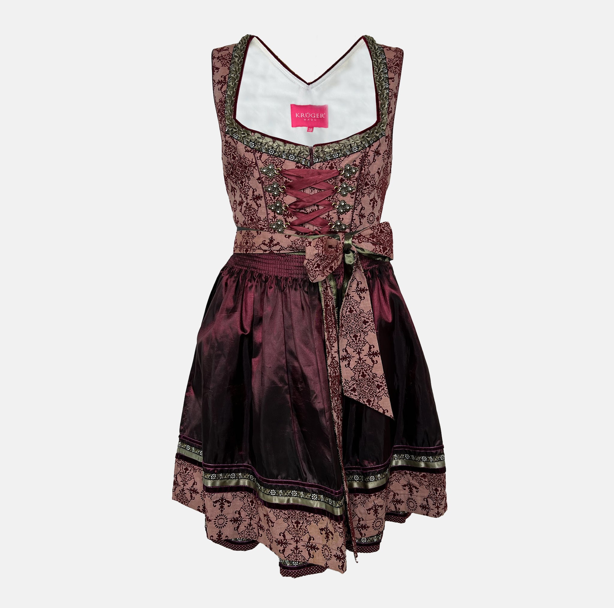 Krüger Dirndl in deep berry and burgundy tones with satin apron and intricate detailing, available for rent on Versatile OTM.