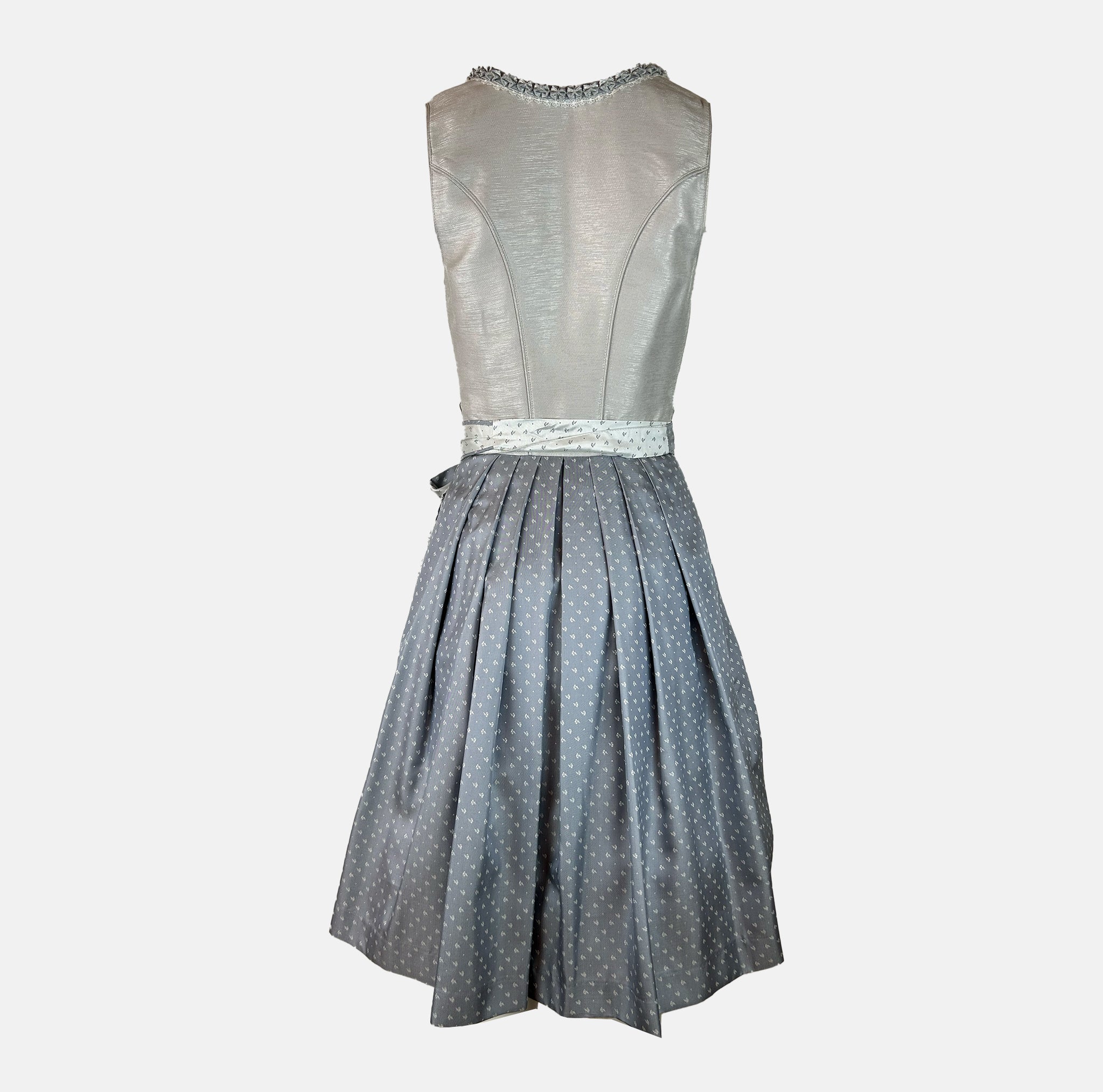 Elegant silver Krüger dirndl with lace details and patterned apron. Rent in Munich or online – perfect for Oktoberfest, weddings, and festive occasions.