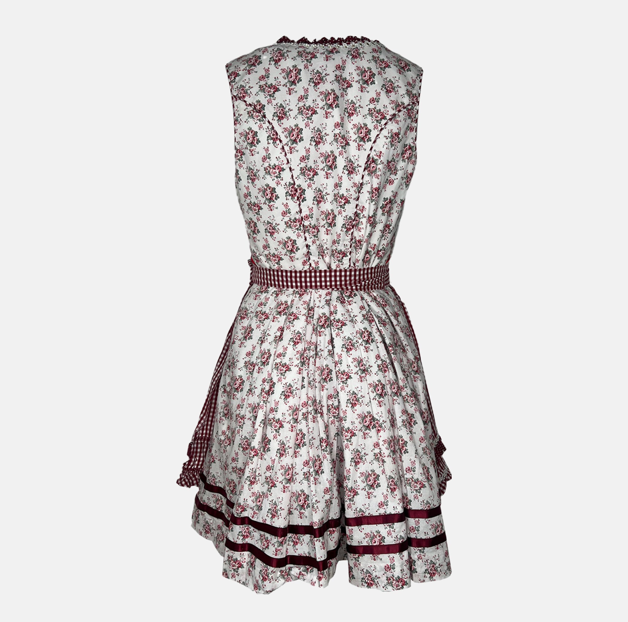 Rent floral Krüger Dirndl with red gingham apron, lace trim, and feminine details – ideal for Oktoberfest or stylish Bavarian celebrations.