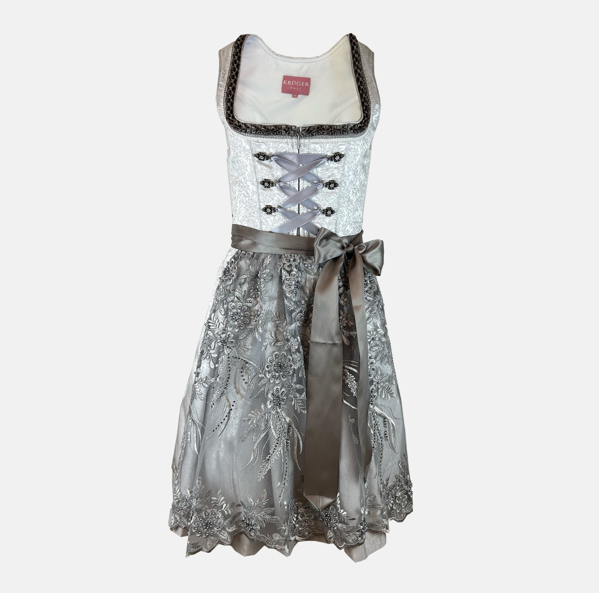 Elegant Macie dirndl for rent in Munich with 60 cm skirt, lace bodice, and detailed apron. Ideal for Oktoberfest, weddings, and traditional celebrations.