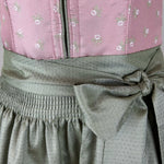 Affordable dirndl dress rental in Munich or online. Rent the elegant Krüger Dirndl Merida in pink—perfect for Oktoberfest and events. Book your dirndl cheap today!