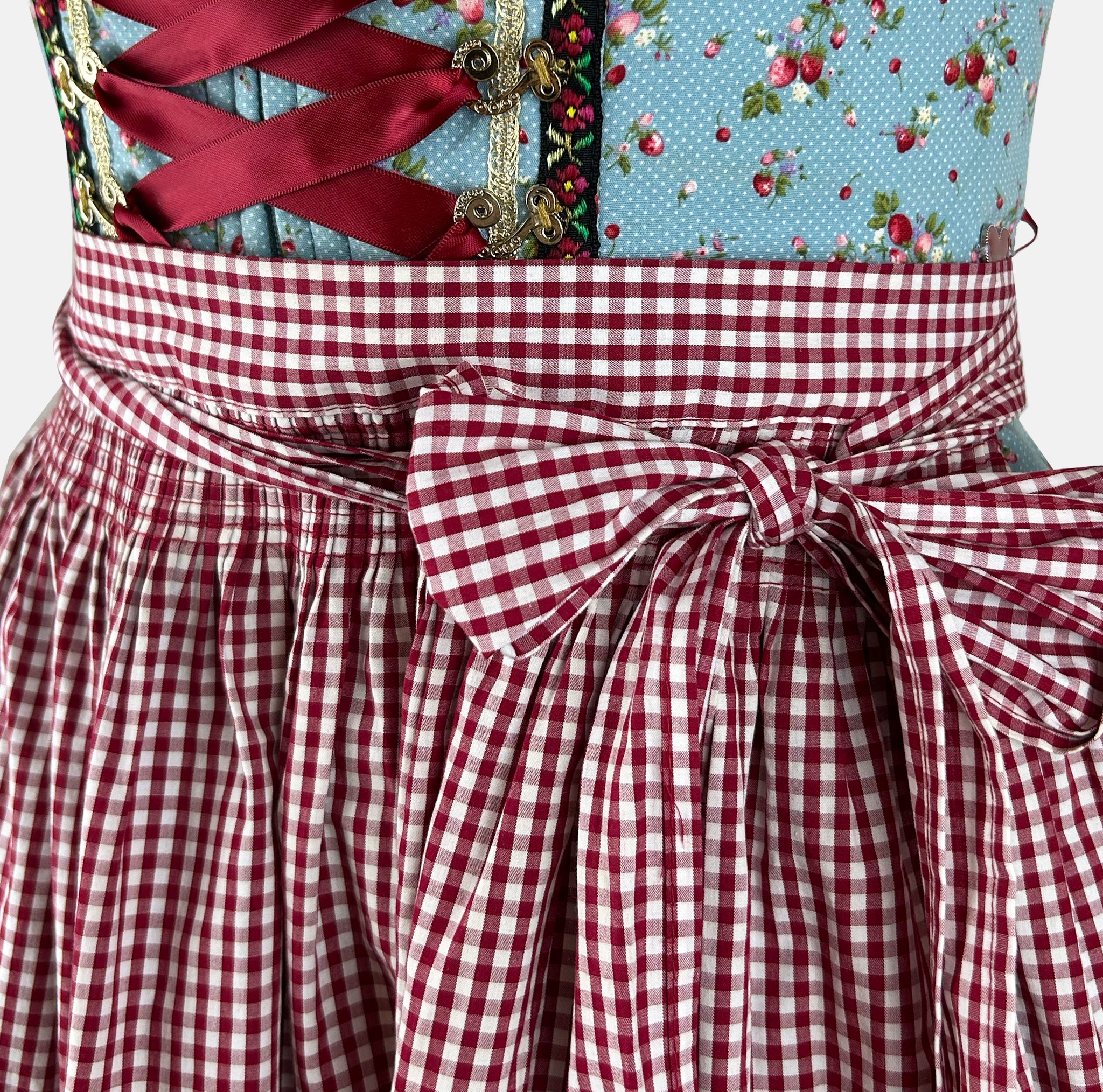 Krüger Madl strawberry-patterned mini dirndl with lace-up bodice and pockets for rent