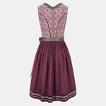 Krüger Dirndl in deep berry and burgundy tones with satin apron and intricate detailing, available for rent on Versatile OTM.
