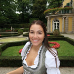 Green Dirndl worn by one of versatile customers renting the dirndl for Oktoberfest. For rental on Versatile OTM website