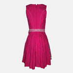 Rent Krüger dirndl dress, vibrant pink bodice, green floral embroidery, gingham apron, youthful rental dirndl for Oktoberfest