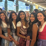 Rented Krueger Dirndl UGC rented on Versatile OTM for Oktoberfest. Four girls wearing Dirndl rented by versatile 