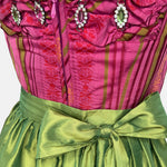 Berwin & Wolff Bavarian rental dirndl with pink striped bodice, jewel button accents, and green apron, available at Versatile OTM in Munich.