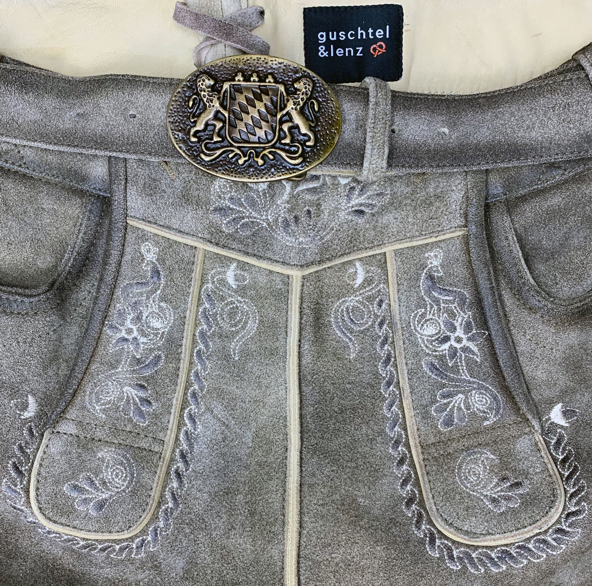 Bavarian Logo on a Lederhosen - rent traditional Bavarian trousers 