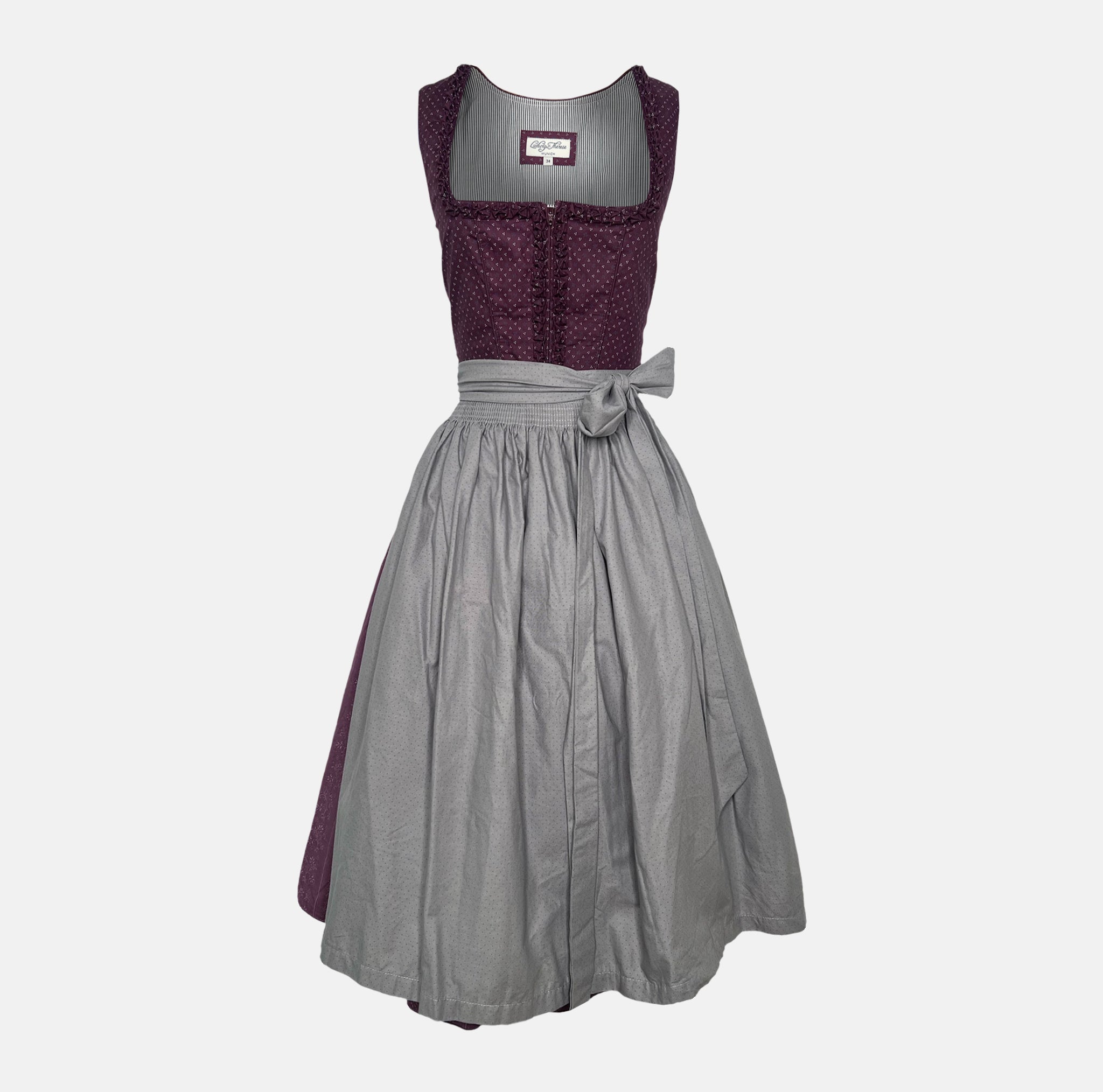 Classic Ludwig & Therese Dirndl is all about timeless elegance with a modern twist. Ready to rent 