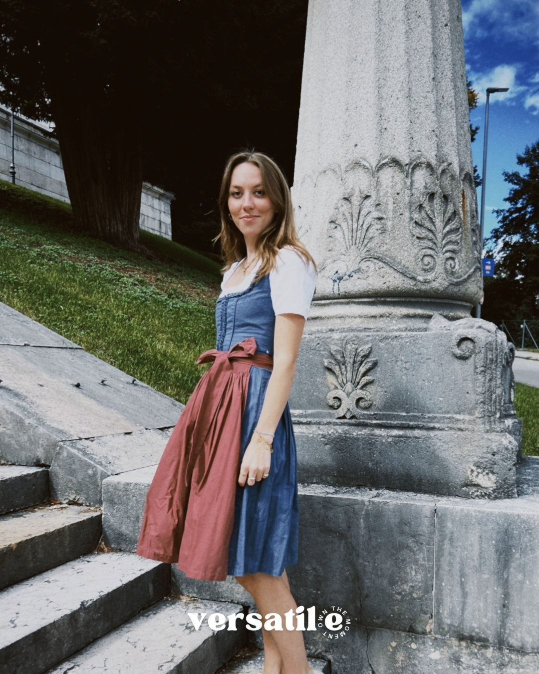 Rent a Ludwig & Therese dirndl in Munich: elegant baby blue and pink design with cotton fabric, square neckline, and zip fastening.