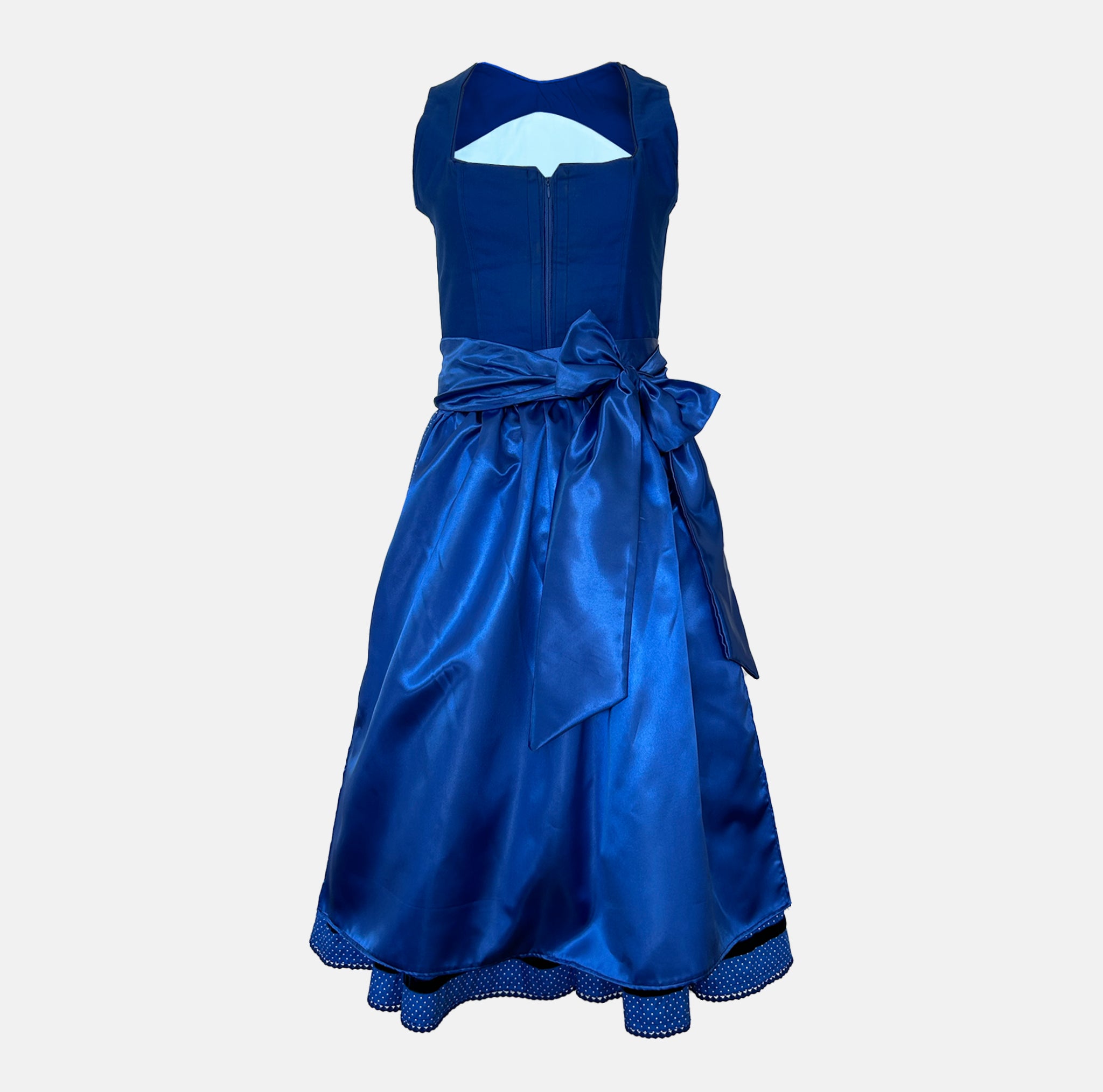 Ma.le.ma handmade dirndl rental via Versatile – royal blue dirndl dress with silk apron bow and dotted underskirt, Munich Oktoberfest outfit