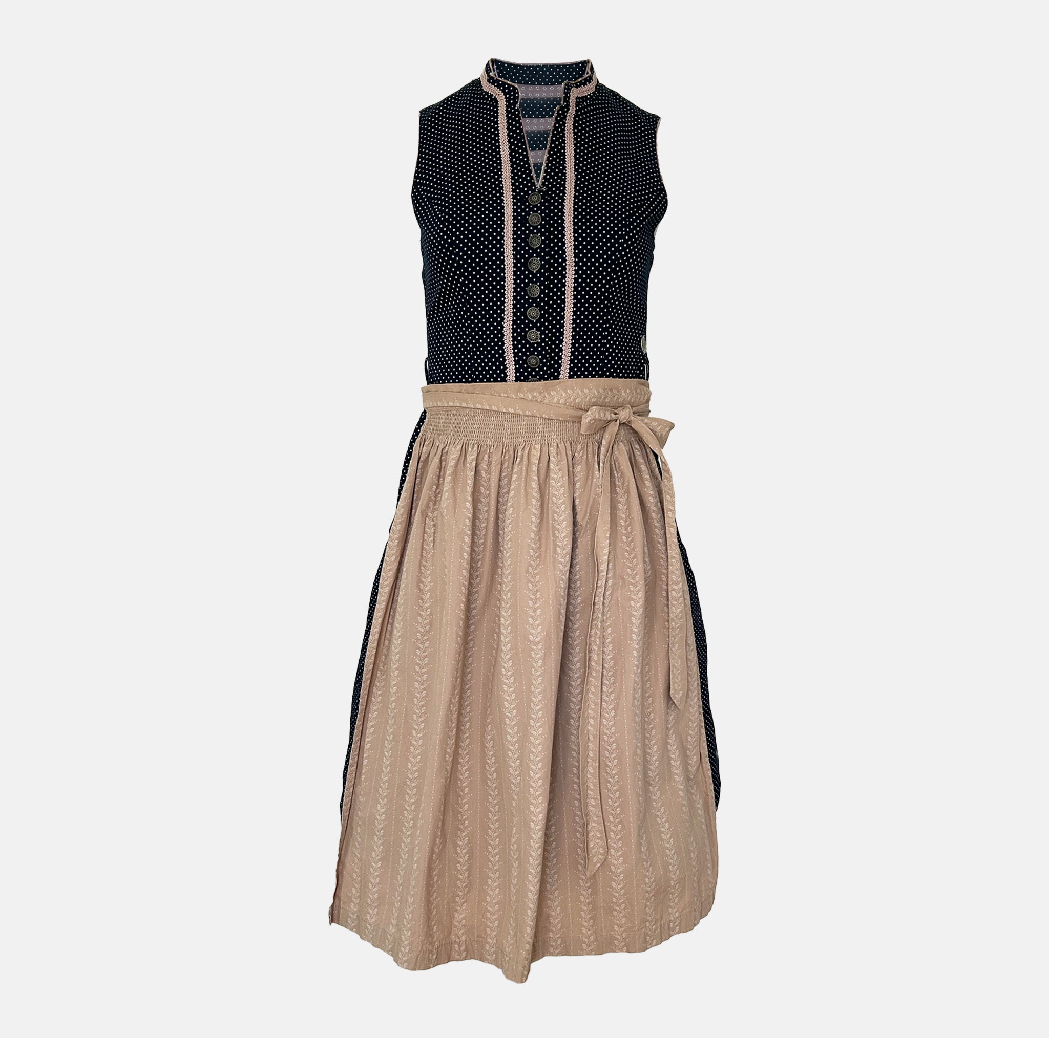Marjo Bavarian rental dirndl with navy dotted button-front bodice and beige patterned apron, available at Versatile OTM in Munich.