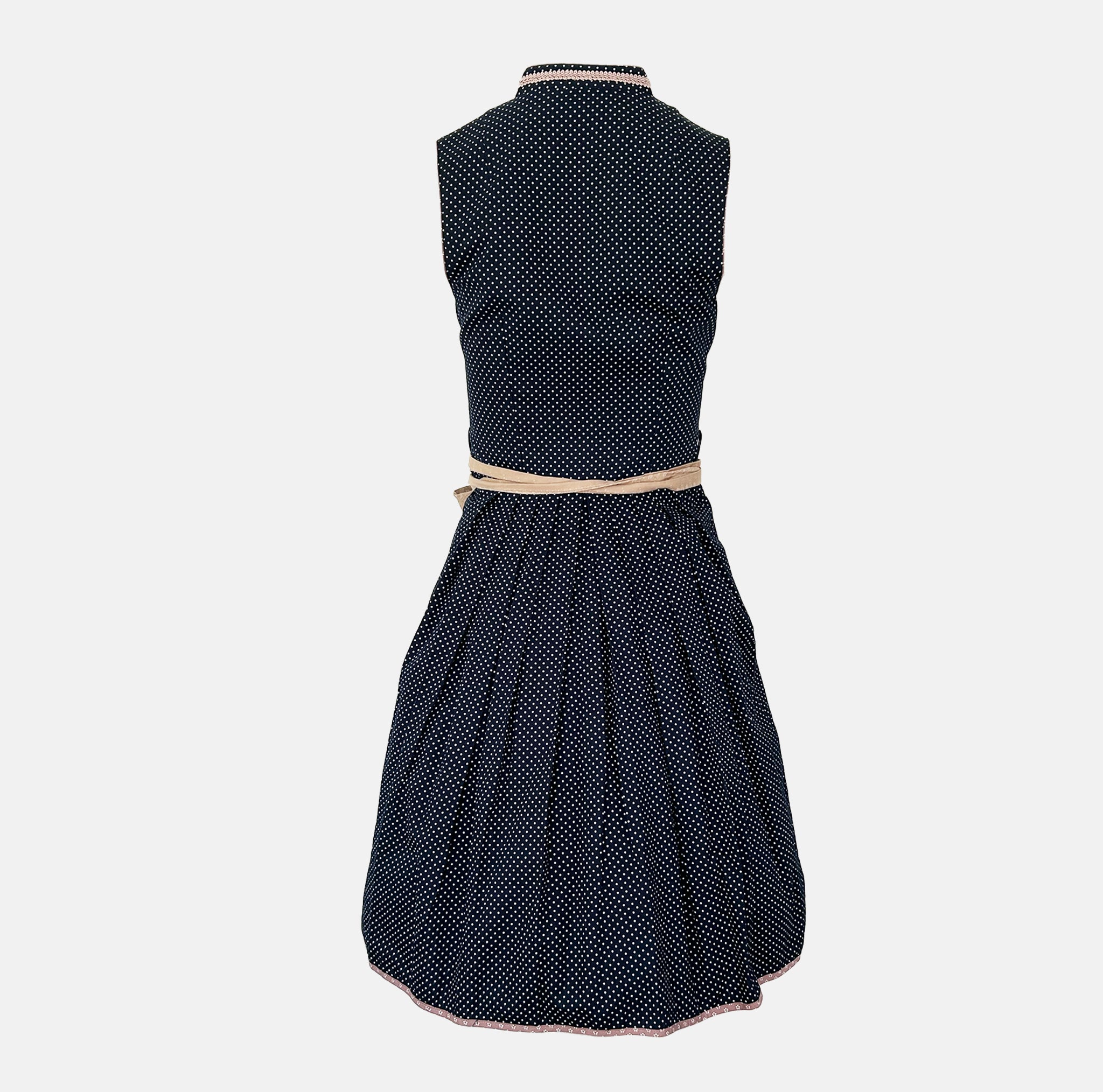 Marjo Bavarian rental dirndl with navy dotted button-front bodice and beige patterned apron, available at Versatile OTM in Munich.