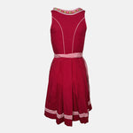 Red Marjo Dirndl with polka dot bodice, gingham skirt, and floral embroidery, available for rent on Versatile OTM.